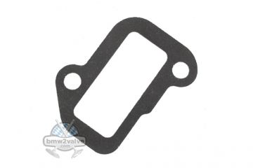 Gasket for engine housing breather valve, front